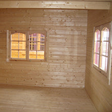 Load image into Gallery viewer, Spacious living area inside the Emily 400 cabin, showcasing wooden finishes and a rustic yet cozy ambiance.