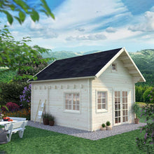 Load image into Gallery viewer, Natural Wood Color Wooden 10x13 Bunkie Installed on Backyard, Gravel, Background of Bushes and Mountains by WholeWoodCabins