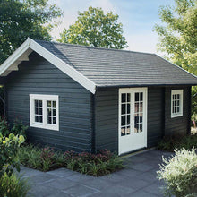 Load image into Gallery viewer, One-storey DIY Cabin and Tiny House with black stained timber walls, black shingle roofing and white window and wall trims. Cabin Caroline side elevation. Two windows and large double front door., by WholewoodCabins