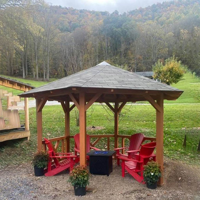 Gazebo Keystone And Red Chairs Below It on North Carolina Mountains by WholeWoodCabins